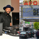 (L-R): DJ D-Nice performs on April 1, 2019 in New York City. ; A billboard at Harlem’s Apollo theater reads “Be Well” on April 24, 2020, in New York City.